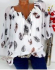 Modna elegancka zwiewna bluzka damska dekolt w łódkę luźna koszulowa oryginalny wzór w pióra z rękawkiem do łokcia