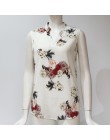 Seksowna szyfonowa bluzka z głębokim dekoktem  bez rękawów w kwiaty czarna biała granatowa