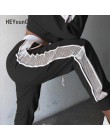 HEYounGIRL Patchwork Mesh kobiety spodnie dresowe czarny biały Baggy spodnie na co dzień Hollow Out Sexy spodnie Streetwear otwo