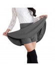 Rozkloszowana krótka spódniczka z wysokim stanem ze spodenkami nowoczesna modna oryginalna