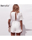 BerryGo Sexy głęboki dekolt w serek kombinezon romper kobiety potargane hollow out haft bawełna biały playsuit elegancki sashes 