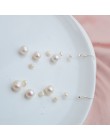 Eleganckie wiszące kolczyki damskie srebrne z ozdobnymi okrągłymi naturalnymi perłami z połyskiem