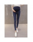 Jeansowe spodnie dla kobiet w ciąży w szerokim pasem elastyczną gumą z guzikami czarne niebieskie modne
