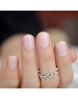 Zestaw sztucznych paznokci z połyskiem w eleganckich kolorach krótkie okrągłe delikatny kształt migdałki artykuły kosmetyczne